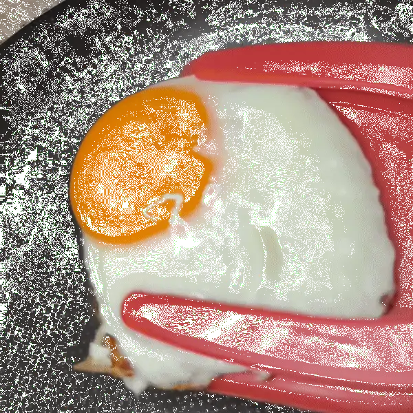 2 -in-1 Pancake Spatula flipping an egg