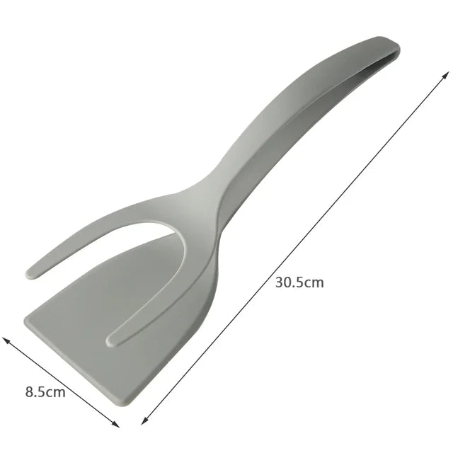 Gray hard plastic spatula / tongs combination tool. Size is 30.5 cm long and 8.5 cm wide