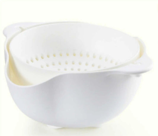 Large white bowl with hanging colander/strainer inside.