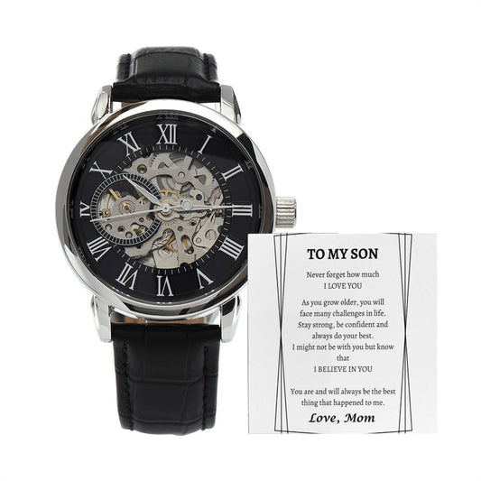 Black leather watch with openworks face. White message card To My Son, Love, Mom.