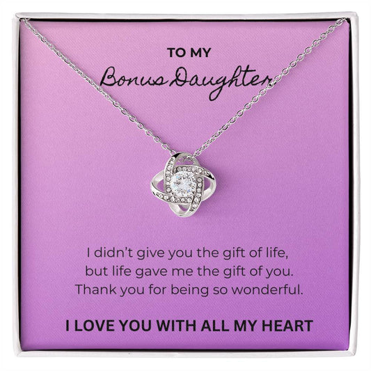 Purple message card that says: To my Bonus Daughter. Love Knot Silver necklace with Cubic Zirconia pendant.