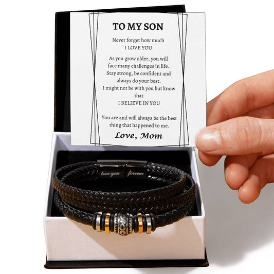 Braided black vegan leather bracelet with decorative beads and "love you forever" engraved on the clasp. White message card reads To My Son, Love, Mom
