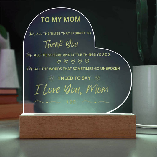 Clear heart-shaped acrylic plaque. To My Mom message. In wooden base.